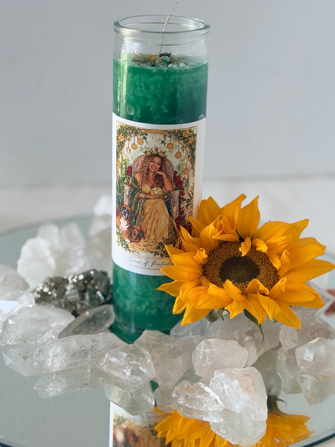 Personalized Queen of Pentacles ritual candle with sunflower and clear quartz crystals