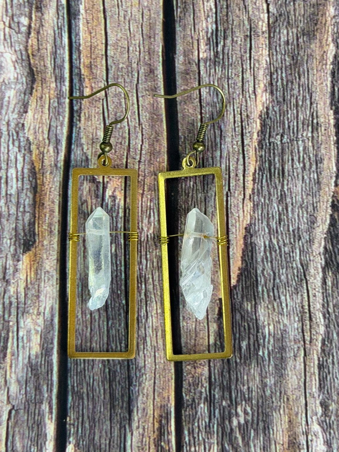 Detail view of the natural crystal points and bronze wire wrapping