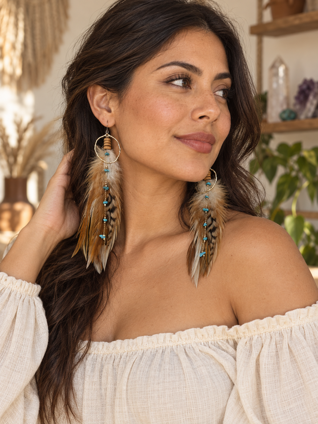 Latina model wearing Desert Sky Feather Hoop Earrings with a cream boho blouse