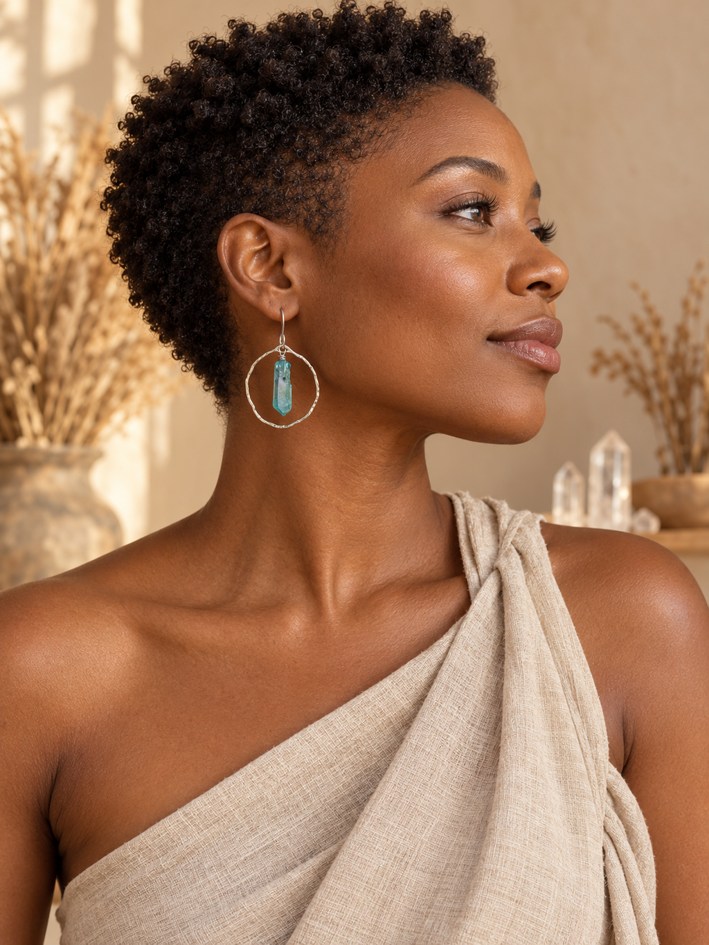 Black model with short natural hair wearing Ocean Aura Crystal Hoop Earrings